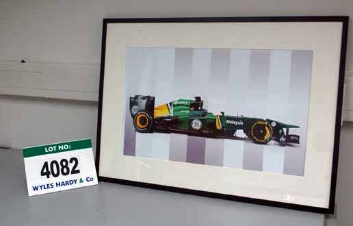 A 900mm x 700mm Framed & Glazed CGI Print depicting a Collage of the LOTUS/CATERHAM 2011, 2012 &