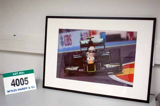 A 900mm x 700mm Framed & Glazed Photographic Print of CATERHAM GP2 2012 Race Car with Giedo Van