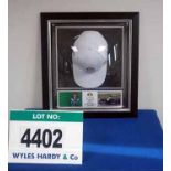 A Framed & Glazed LOTUS RACING 2010 Baseball Cap, NOT Signed by Jarno Trulli (Sample Only) (Want