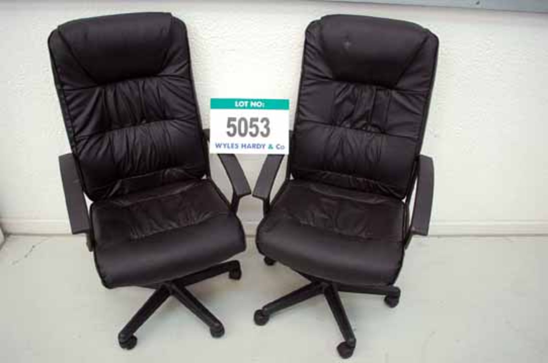 Two Black Leatherette Swivel Elbow Chairs (Note Dismantled; DOLAV Not Included with this Lot) (