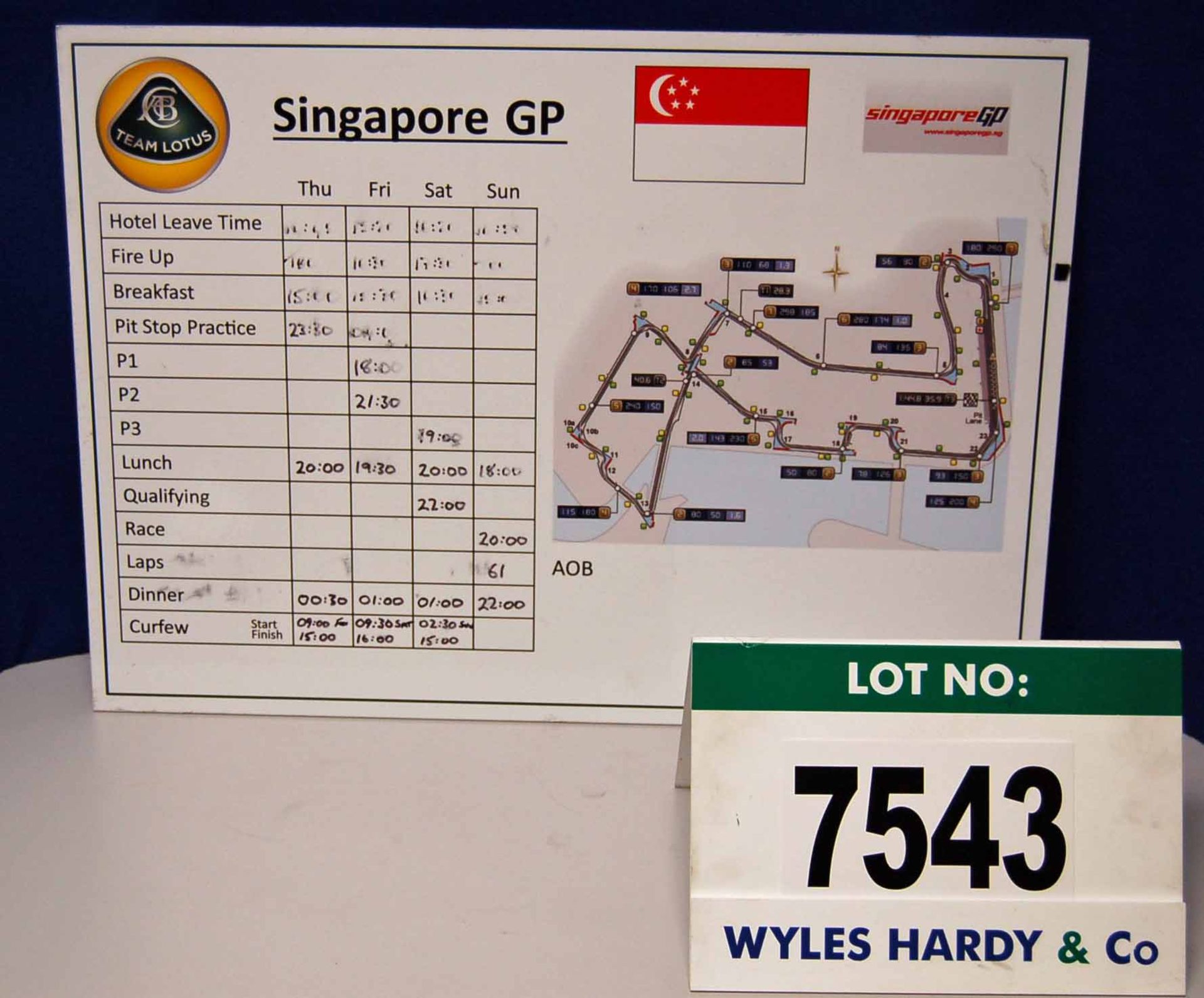 A 700mm x 500mm TEAM LOTUS Pit Crew Information Board - Singapore Grand Prix  Want it shipped?