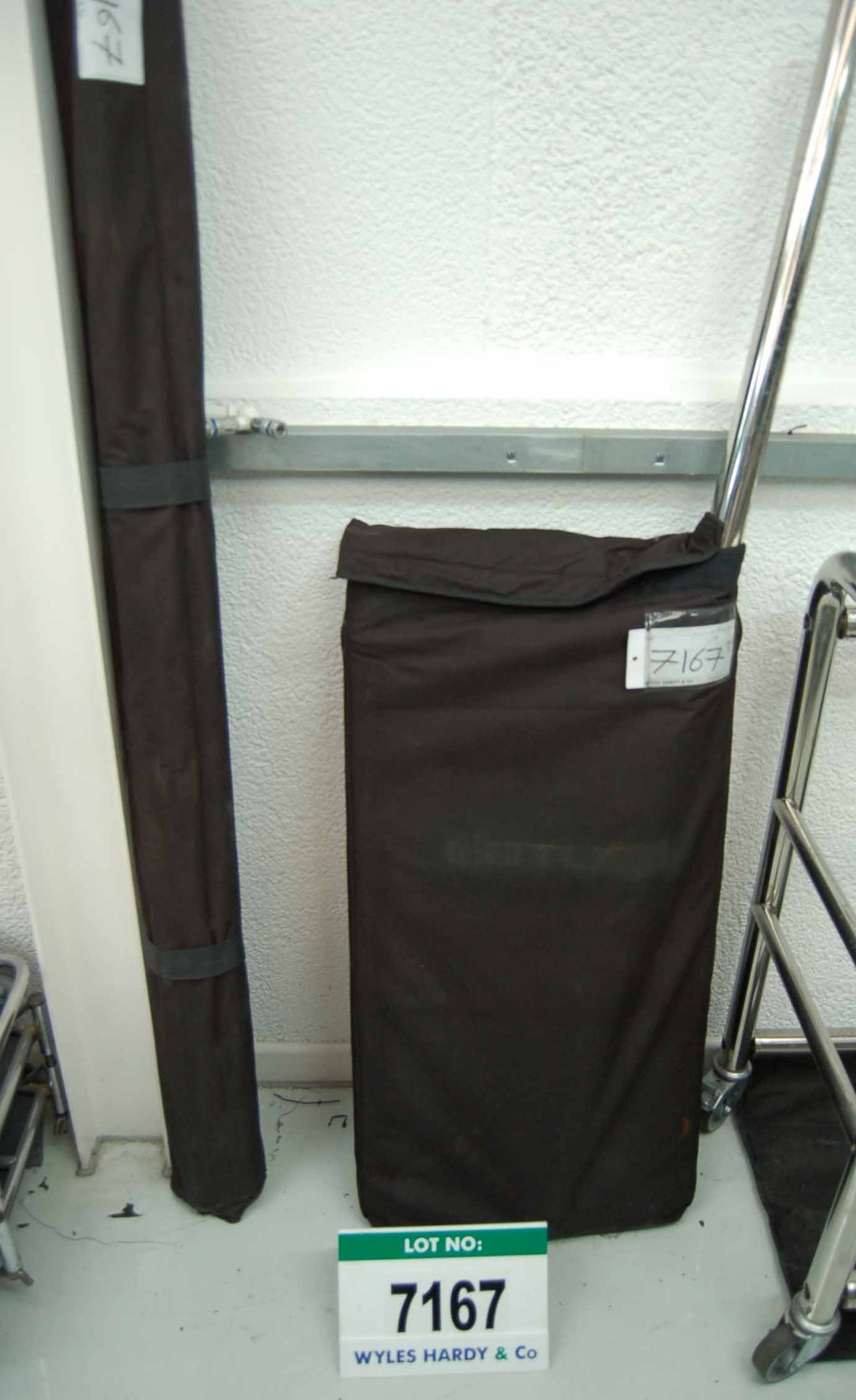 A Stainless Steel Mobile 2-Tier Tyre Mover with Black Travel Bag (Note Assembly Bolts Missing as