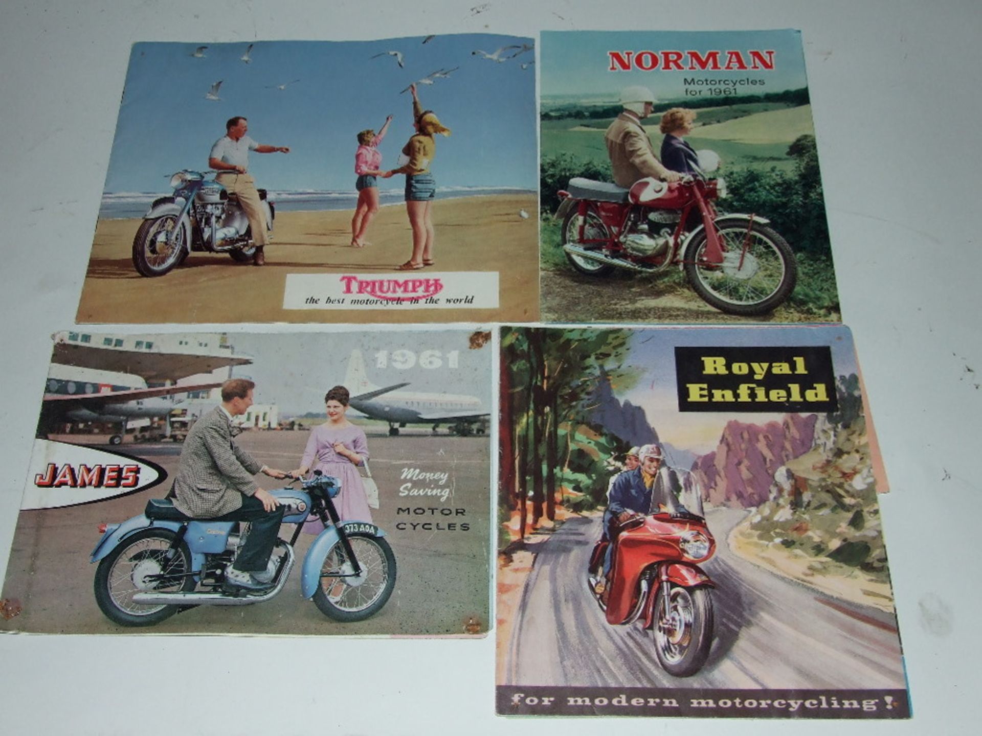 Assorted motorcycle brochures, handbooks