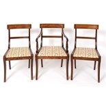 A set of seven mahogany dining chairs, on sabre legs (6+1) (7)  See illustration