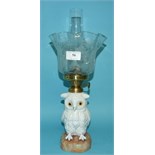 An oil lamp base, in the form of an owl, with an etched glass shade, 37 cm high
