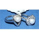 Two silver, pearl and diamond dress rings