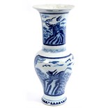 A Chinese vase, decorated panels of Dogs of Fo in underglaze blue, 52 cm high  See illustration
