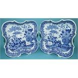 A pair of blue and white transfer printed pottery serving dishes, decorated flowers, each marked