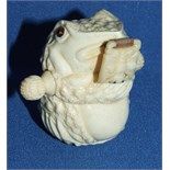 A novelty tape measure, in the form of a toad, 5 cm high