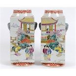 A pair of Chinese cong vases, decorated figures, 33 cm high (2)  See illustration Report by RB  In