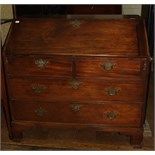 WITHDRAWN: A 19th century mahogany bureau, the fall front revealing a fitted interior, above four