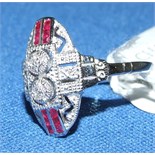 An Art Deco style 9ct white gold, ruby and diamond ring