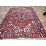 A Heriz carpet, 308 x 214 cm