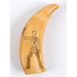 A 19th century scrimshaw tooth, decorated a sailor waving his hat, 13.5 cm  See illustration