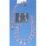 A silver and amethyst necklace, with matching bracelet, ring and a pair of drop earrings