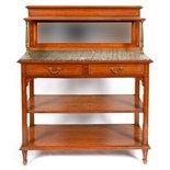 An Edwardian satinwood buffet, the superstructure above a marble top, with two frieze drawers and