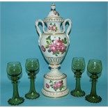 A Meissen style porcelain vase, cover and stand, with serpent handles and floral painted decoration,