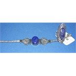 A silver and lapis lazuli bracelet, and a similar ring (2)