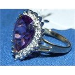 A 9ct gold, amethyst and diamond ring