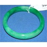 A green hardstone bangle