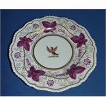 A Worcester Flight, Barr & Barr plate, crested, with painted and gilt decoration, 23.5 cm wide