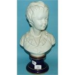 A Parian style bust, of a boy, on a socle base, 38 cm high