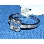 An 18ct white gold and diamond ring