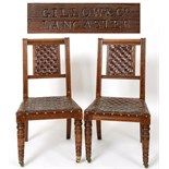 A set of six Gillow walnut dining chairs, with leather backs and seats, and turned front legs,