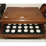 A tabletop collector's chest, of six drawers, containing 110 plaster intaglios, decorated