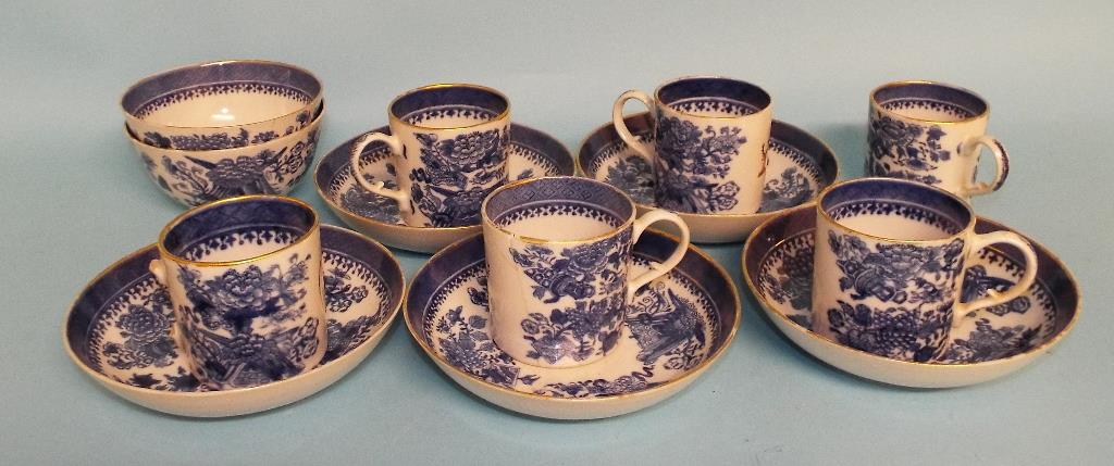 Five Chinese export porcelain cups and saucers, crested, with underglaze blue decoration, another