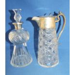 A claret jug, with silver mounts, Sheffield 1912, 23 cm high, and a glass decanter in the form of
