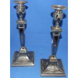 A pair of Regency style silver plated candlesticks, 31.