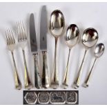 A canteen of silver Hanoverian cutlery, comprising eight table knives, eight dessert knives,