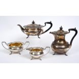 A silver four piece tea and coffee service, with a wavy rim, and pad feet, Elkington & Co,