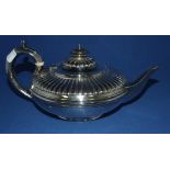 An early 19th century silver teapot, of compressed circular form, London 1826, approx. 18.