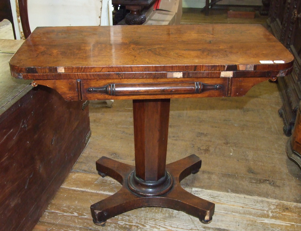 An early Victorian rosewood card table,