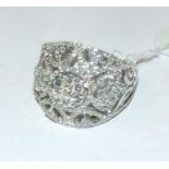 An 18ct white gold and diamond set clust