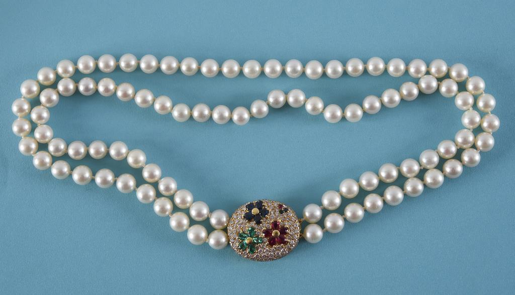A two strand pearl necklace, with an 18c