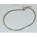 An 18ct white gold and 73 stone diamond line bracelet Condition report Report by