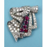 An Art Deco style diamond and ruby clip