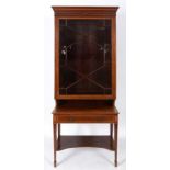 An Edwardian inlaid mahogany display cab