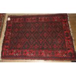 A Persian rug, 127 x 88 cm