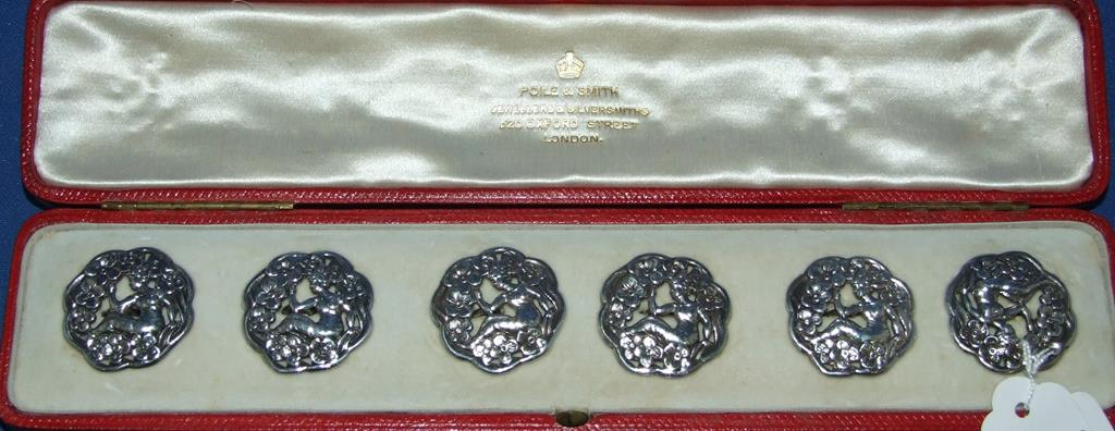 A set of six silver Art Nouveau buttons,