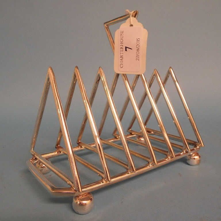 A Christopher Dresser style plated toast rack,