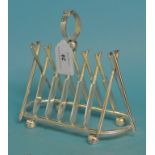 A plated toast rack, in the form of cricket bats, 16.