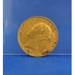 A Queen Victoria sovereign,