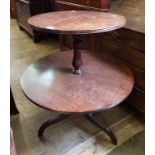 A mahogany two tier dumb waiter,