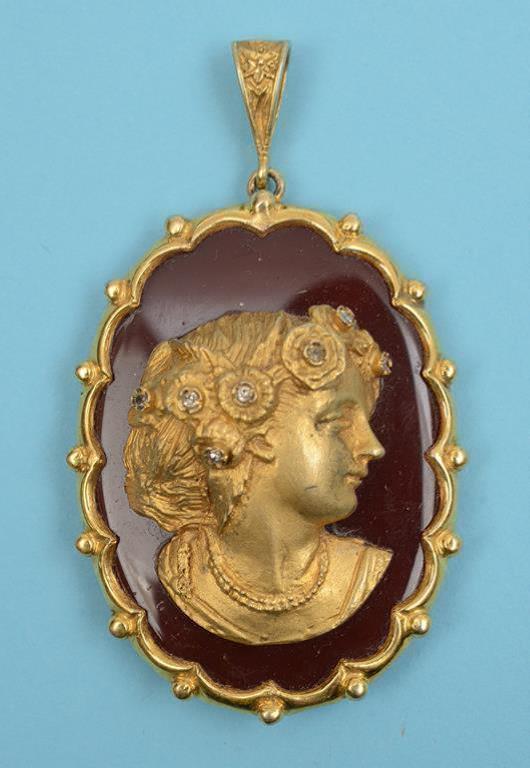A 9ct gold and cornelian pendant, applied a bust of a lady, white stones NOT DIAMONDS  See front