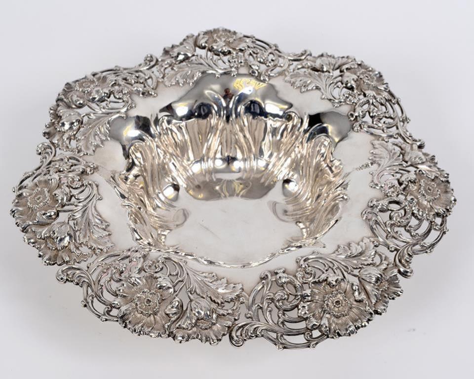 An American sterling silver bowl, of shaped circular form, pierced flowers and scrolling foliage,