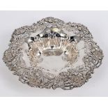 An American sterling silver bowl, of shaped circular form, pierced flowers and scrolling foliage,